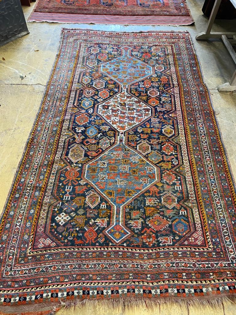 An early 20th century Shiraz blue ground carpet, 310 x 170cm